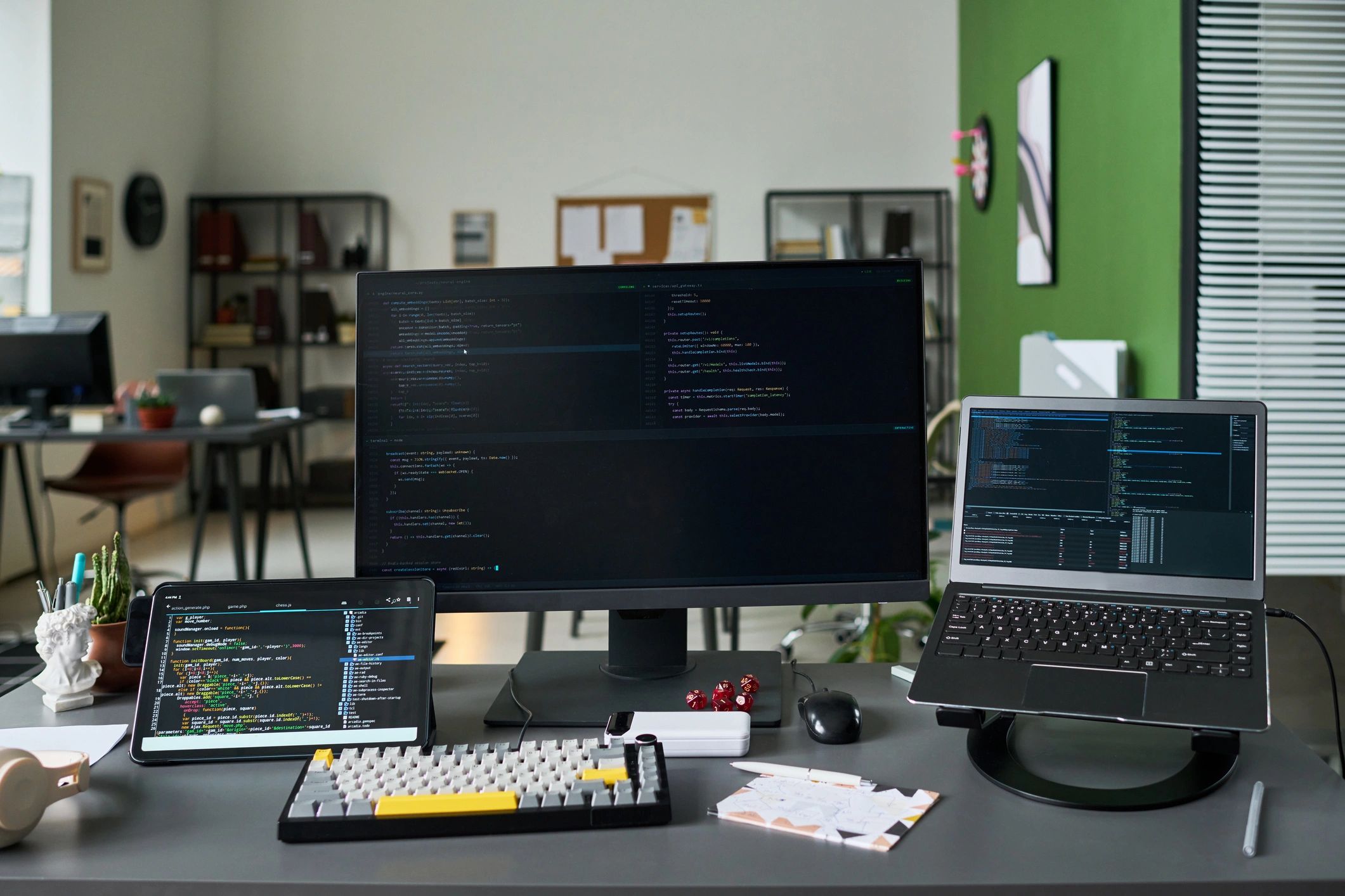 Software development workspace with multiple screens